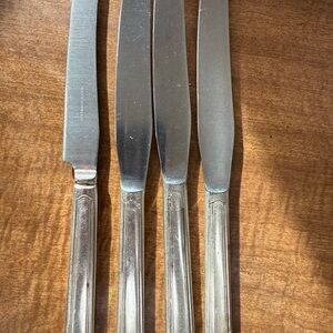 Set of Four Silver Knives